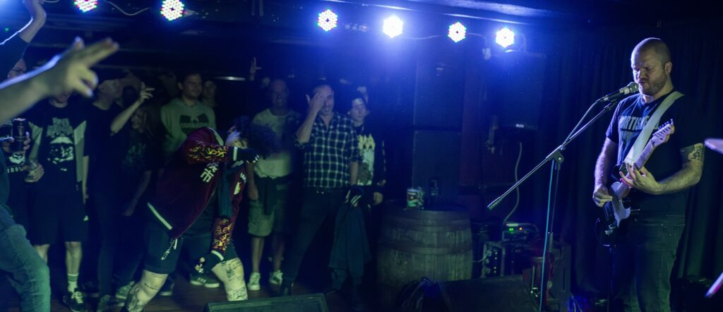 Punk/Grind Thumbucker live at The Golden Lion with crowd in shot